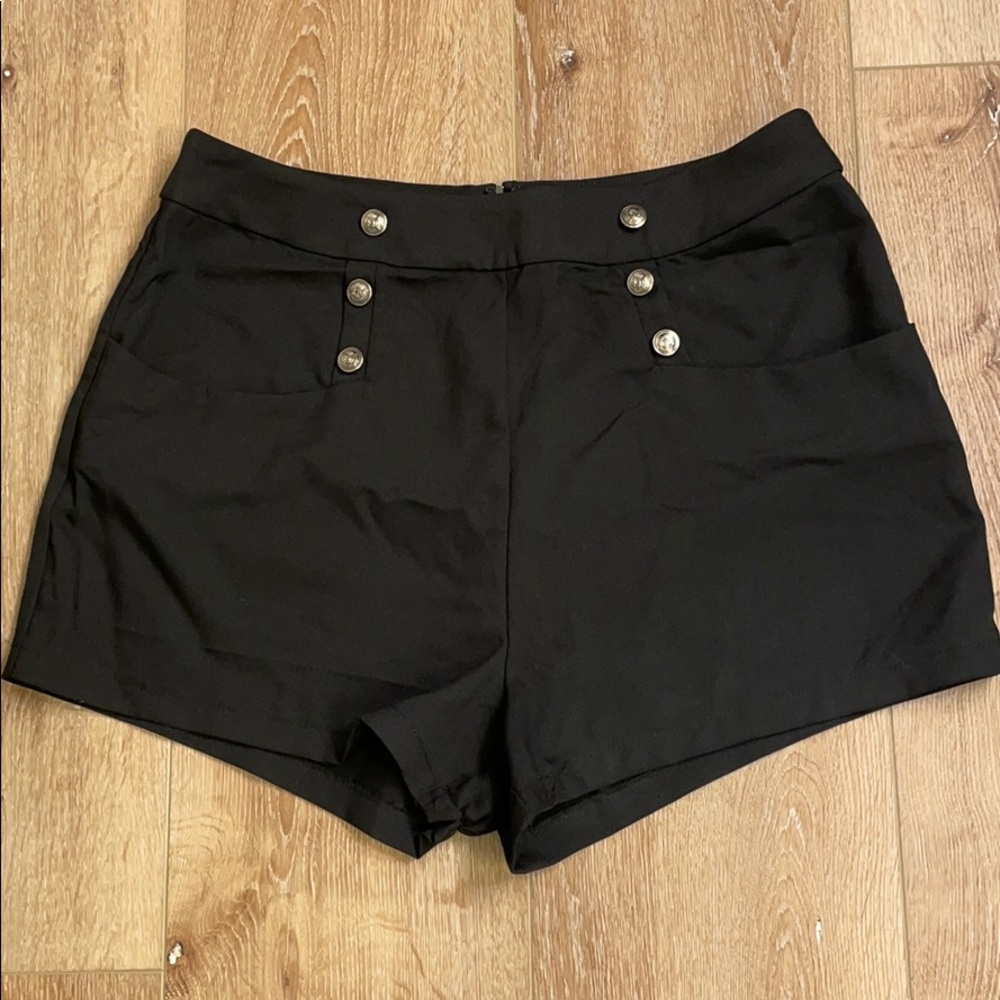 Unique Vintage high waisted black shorts.